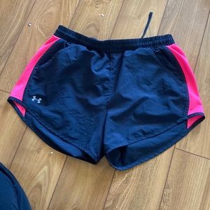 Pink and black under armor shorts women’s size small
